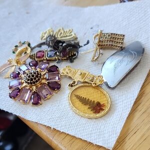 Elegant Gold and Purple Gemstone Brooch